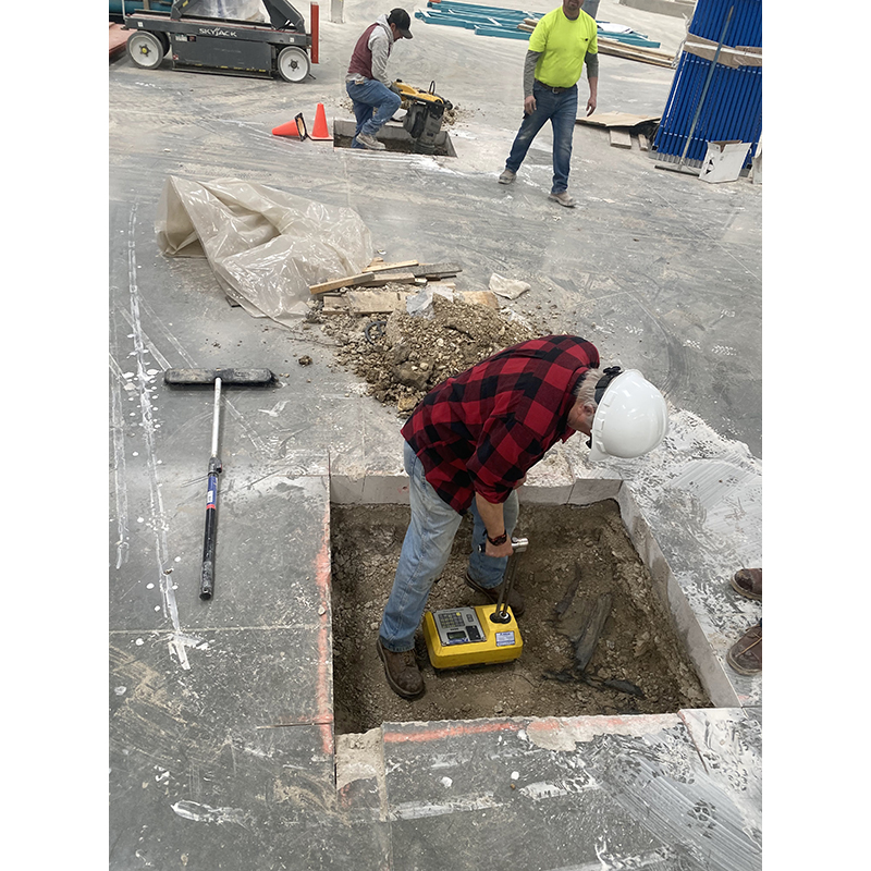Concrete construction services to install and upgrade electrical and plumbing services.