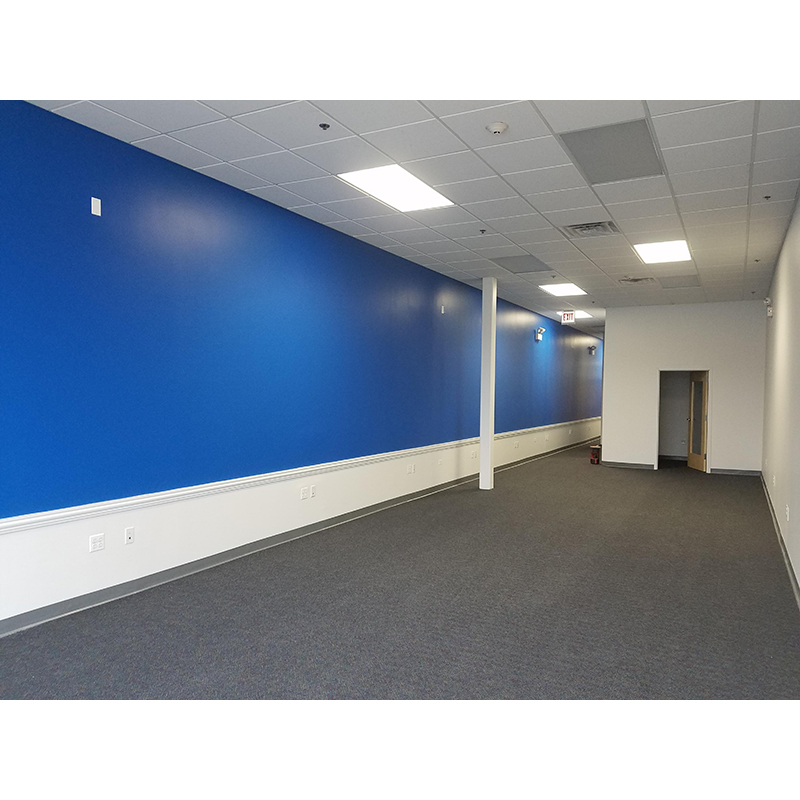 Interior buildout of walls, ceiling and flooring.